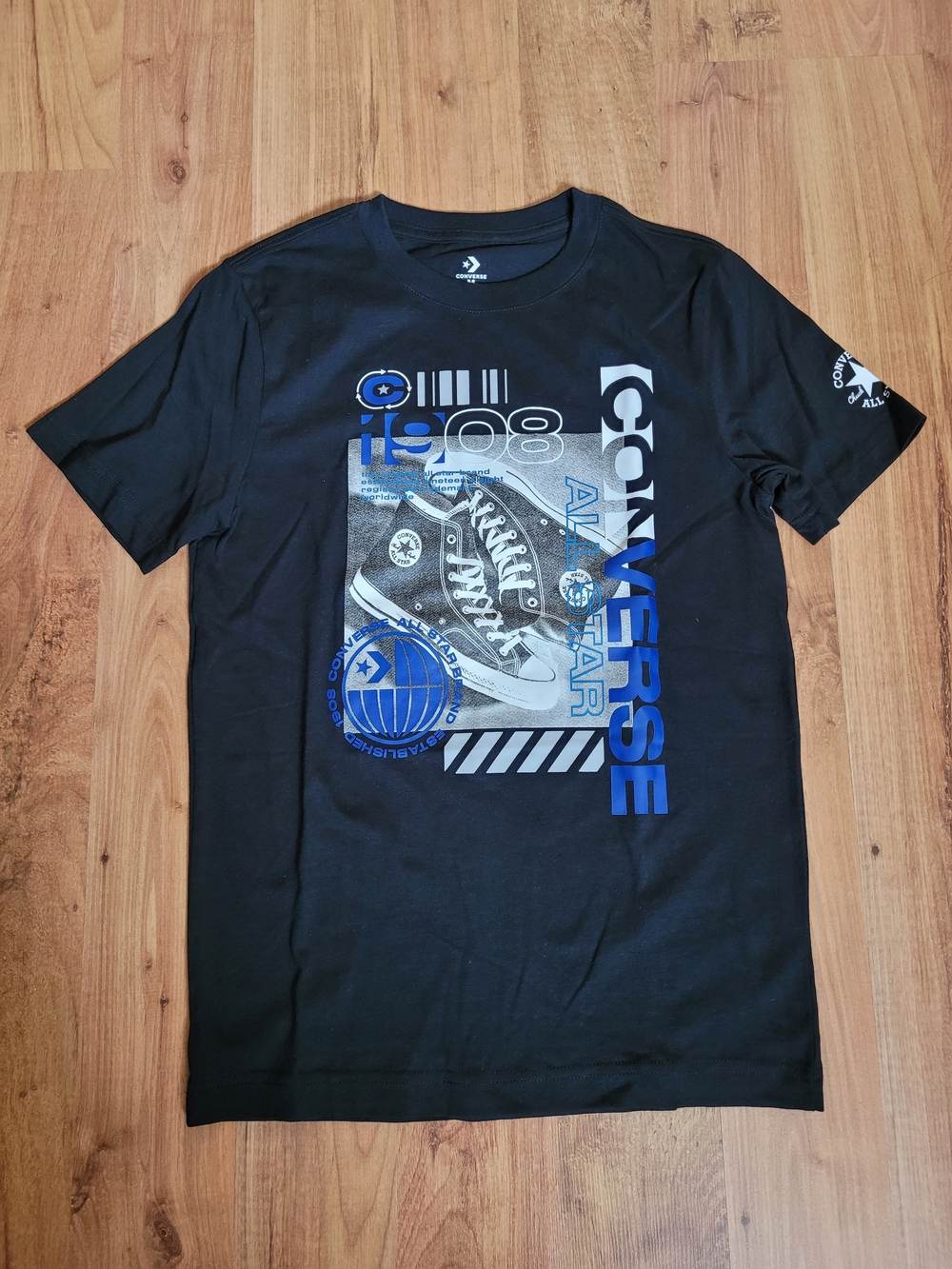 Converse Black Tee with Blue and White Graphic Sneaker Design